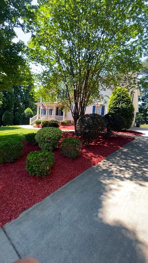 Front yard bed with fresh red mulch